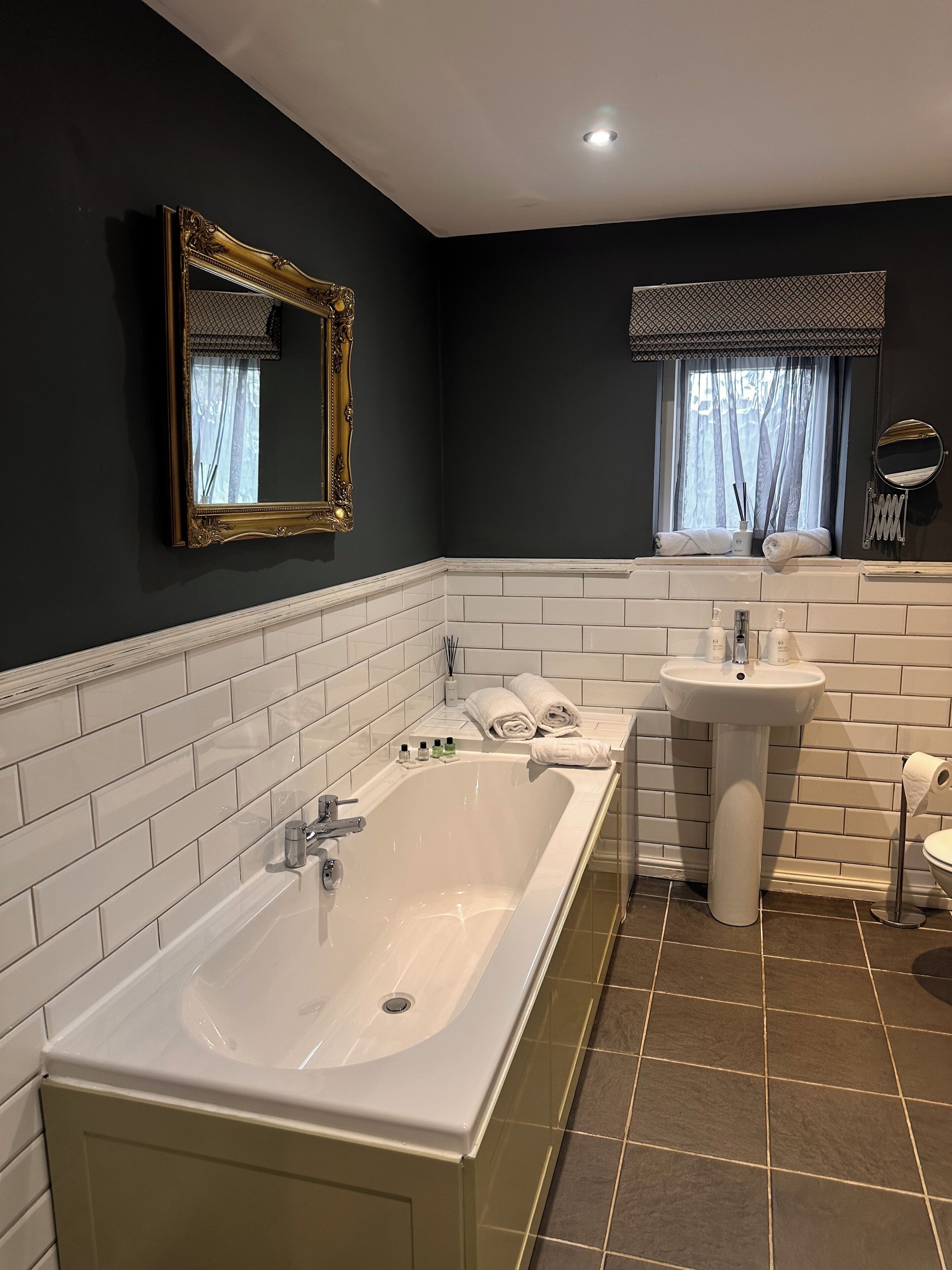 gawsworth suite | bathroom | combined shower/bathtub, deep-soaking bathtub, rainfall showerhead