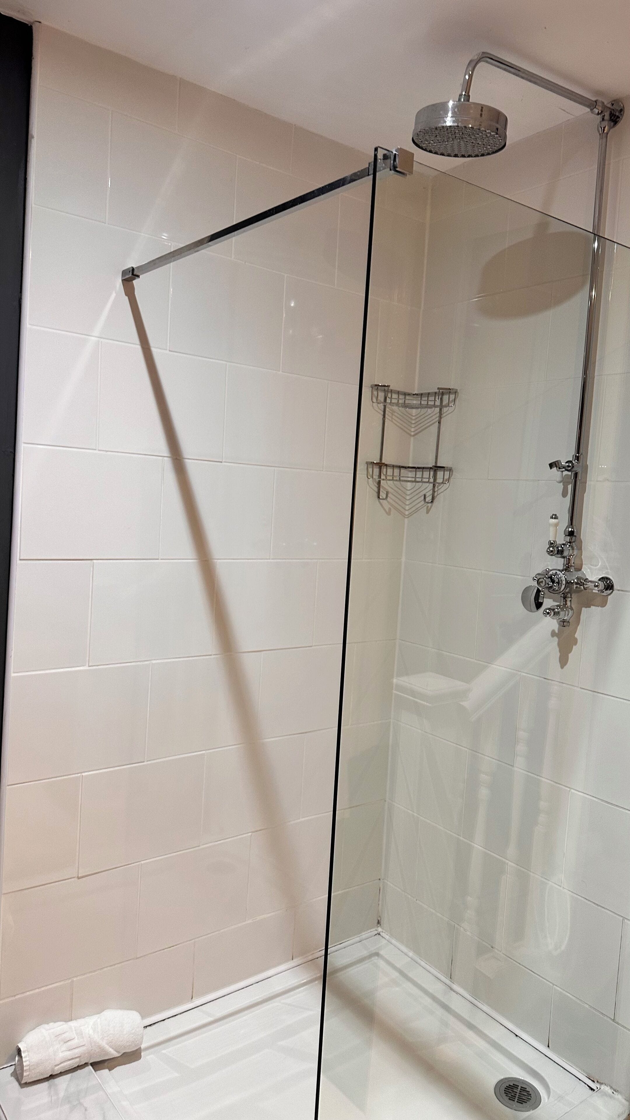 combined shower/bathtub, deep-soaking bathtub, rainfall showerhead