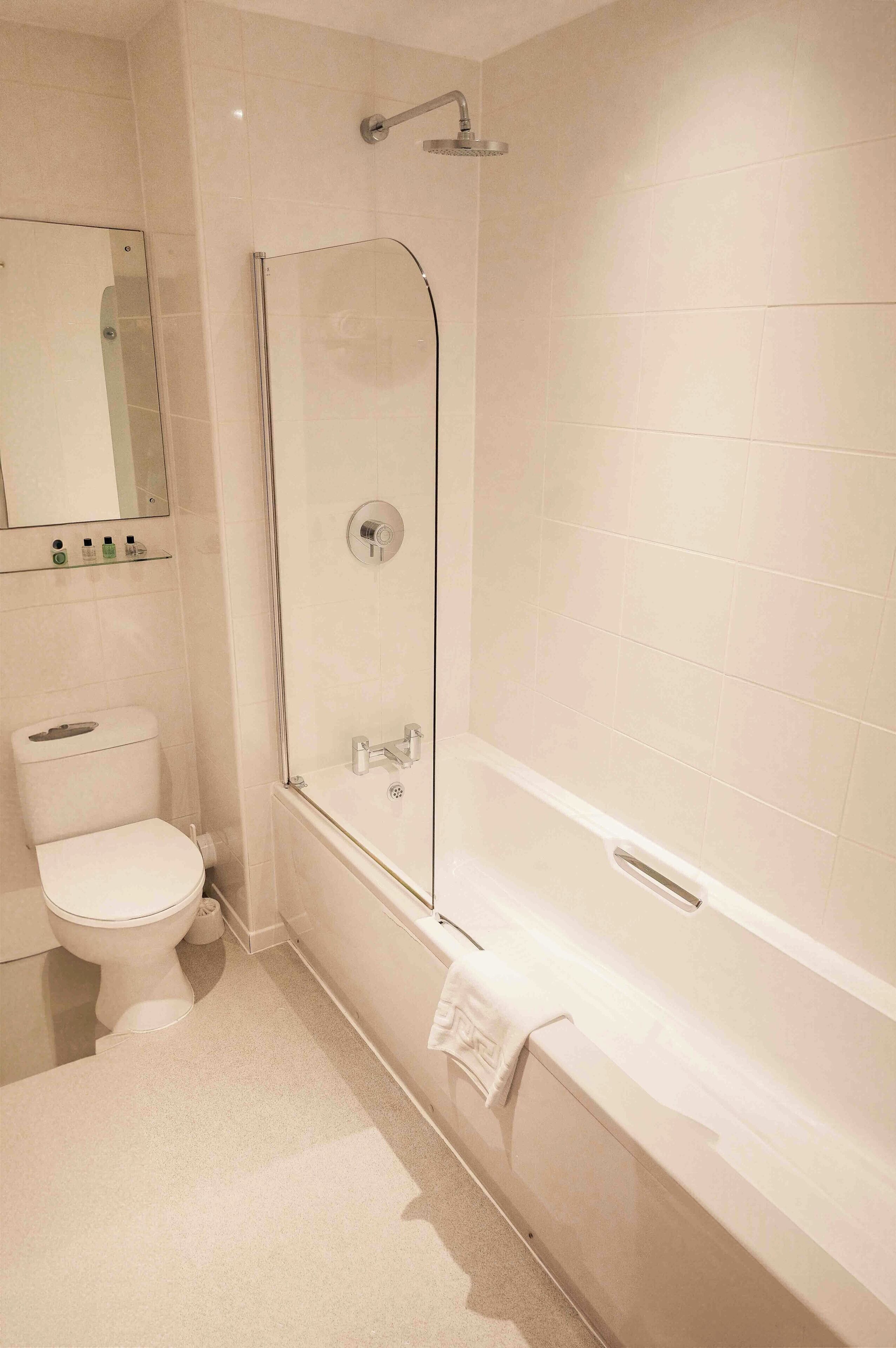 combined shower/bathtub, deep-soaking bathtub, rainfall showerhead