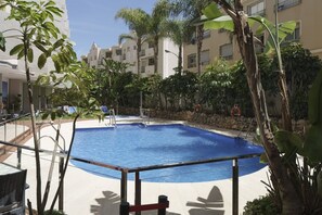 2 outdoor pools, pool umbrellas, pool loungers