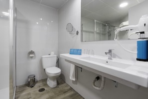 Hair dryer, towels, soap, shampoo