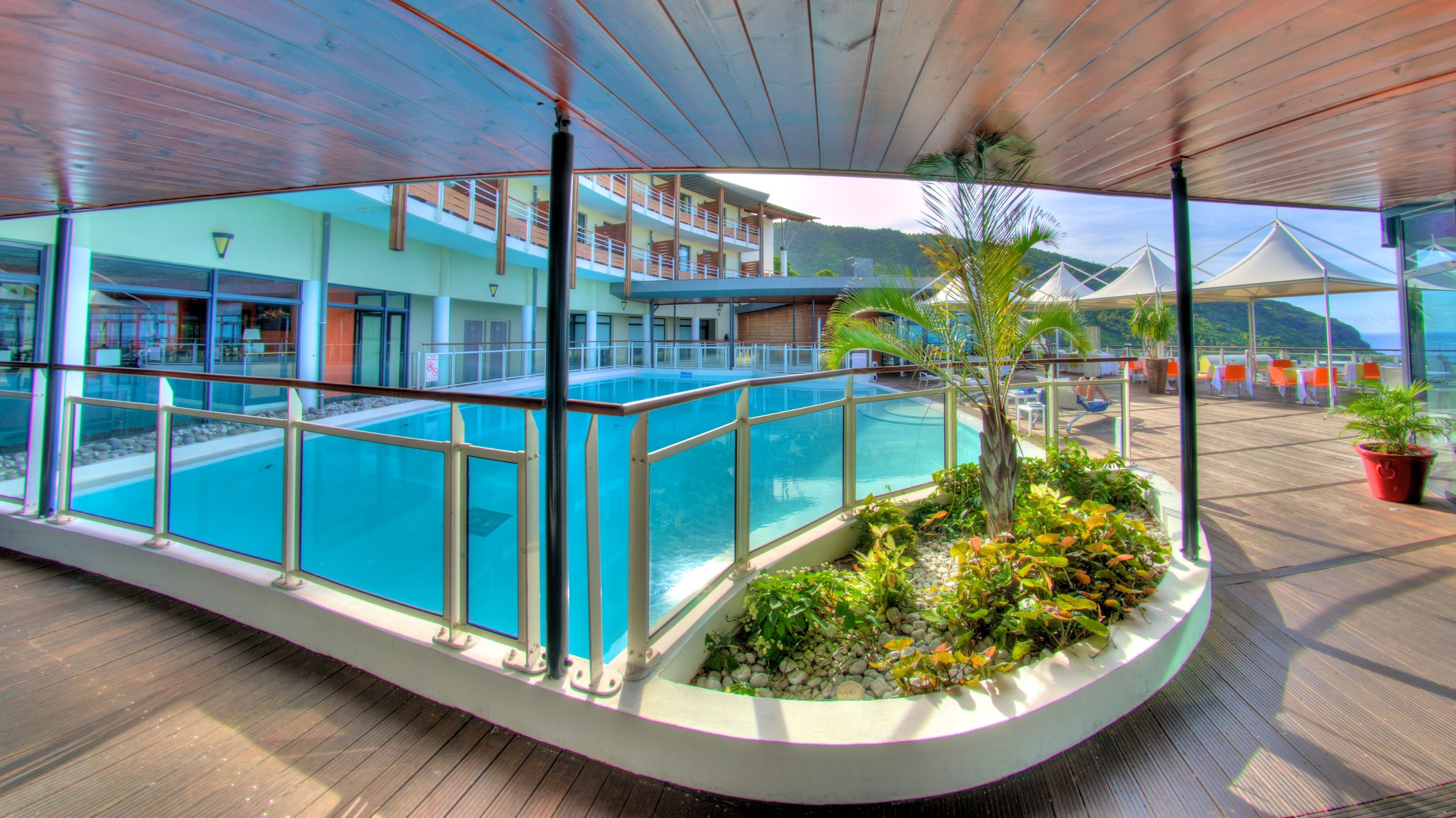 outdoor pool, open 7:00 am to 9:00 pm, pool umbrellas, pool loungers