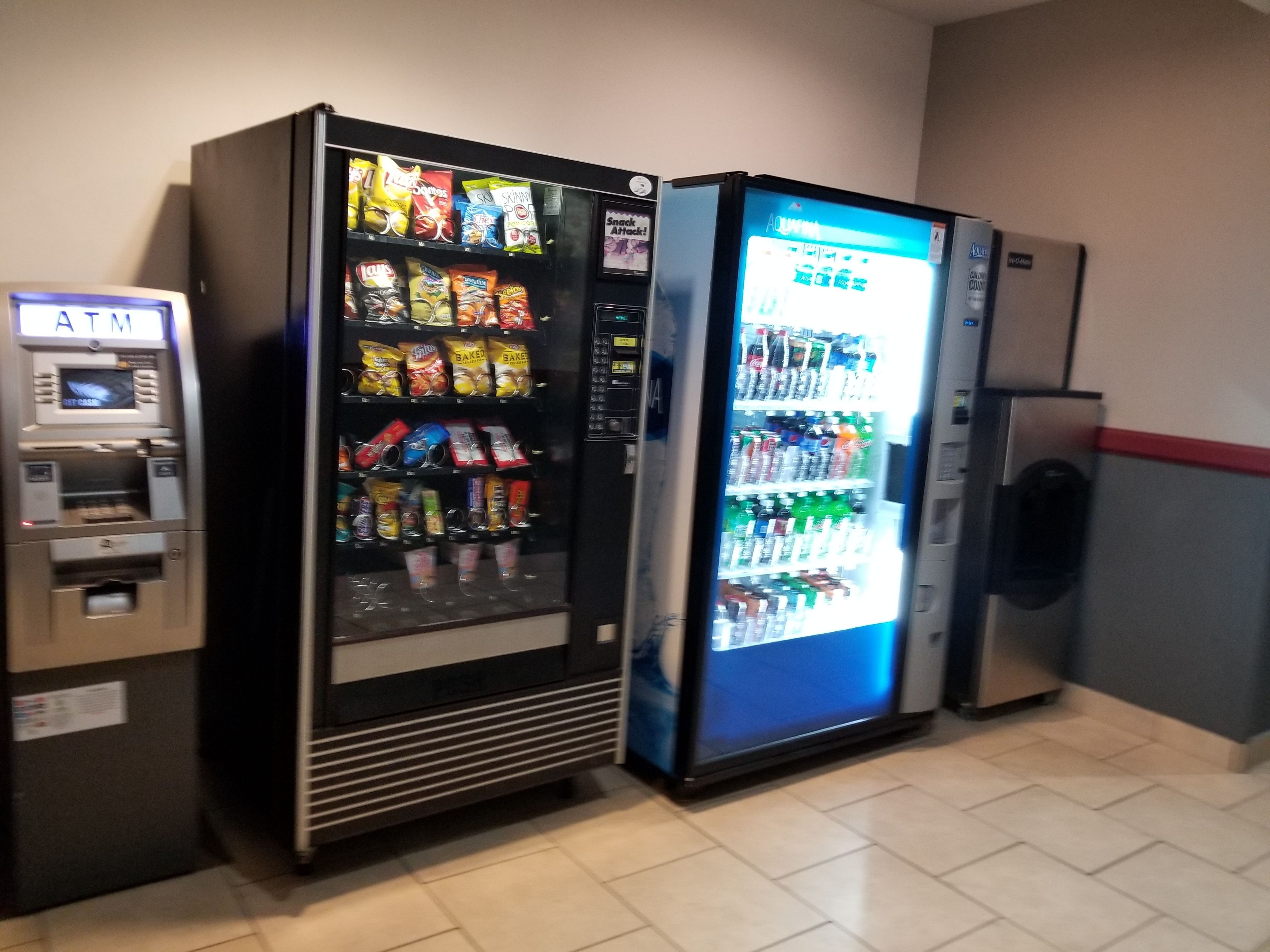 A vending machine with snacks and a beverage dispenser.