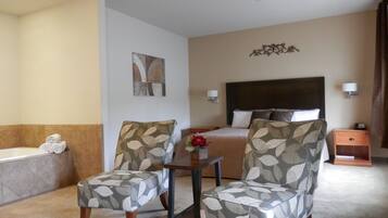 King Suite - 1 king bed w/jetted tub | Desk, blackout drapes, iron/ironing board, free WiFi