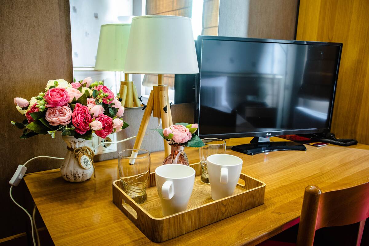 Deluxe Double or Twin Room | Minibar, in-room safe, iron/ironing board (on request), WiFi (free)