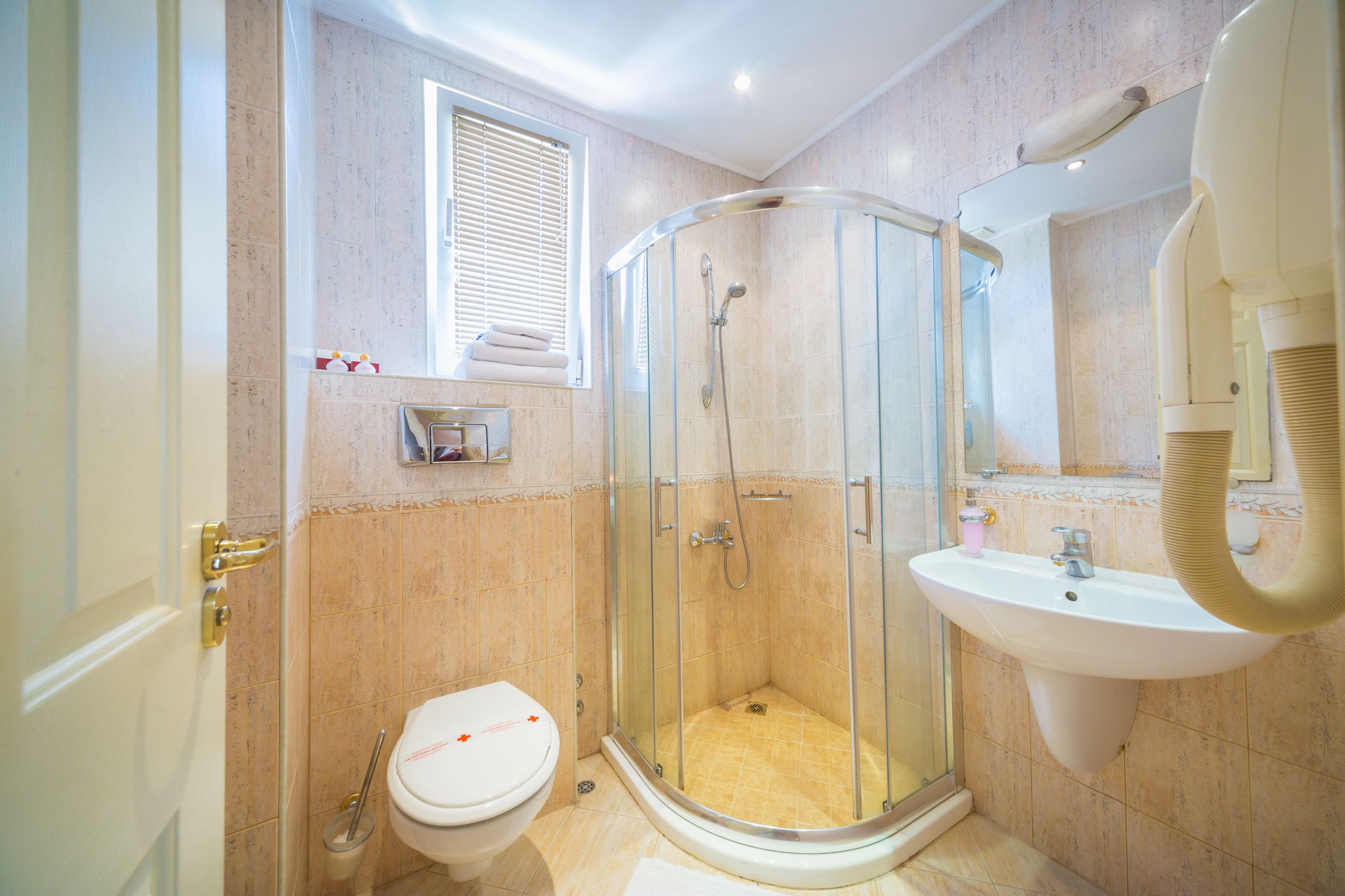 standard double or twin room | bathroom | hair dryer, towels