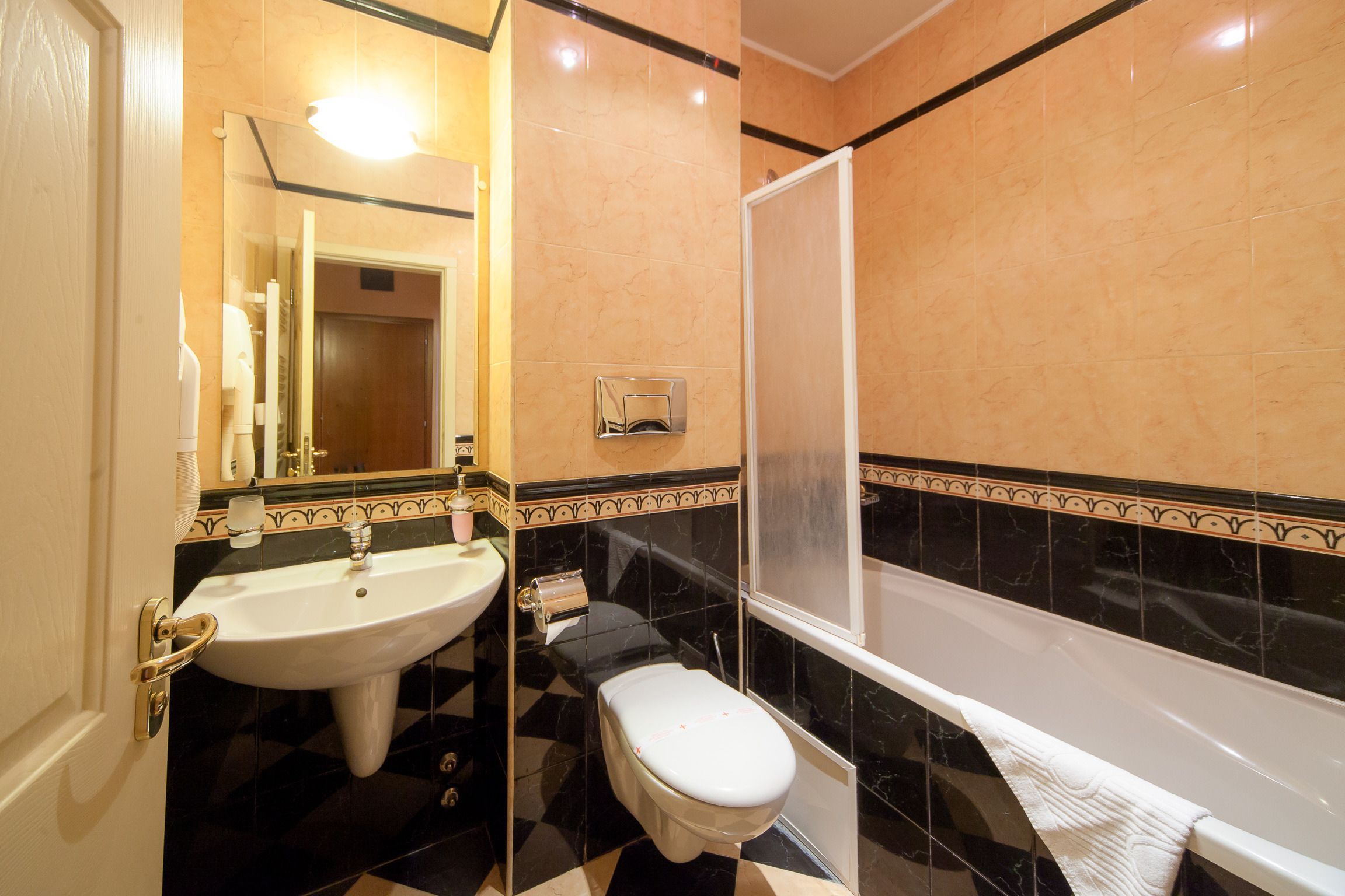 standard apartment | bathroom | hair dryer, towels