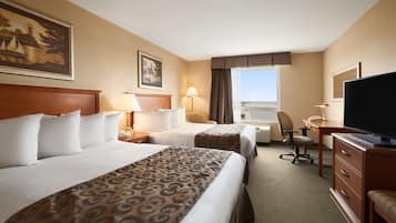 Premium bedding, desk, laptop workspace, blackout curtains