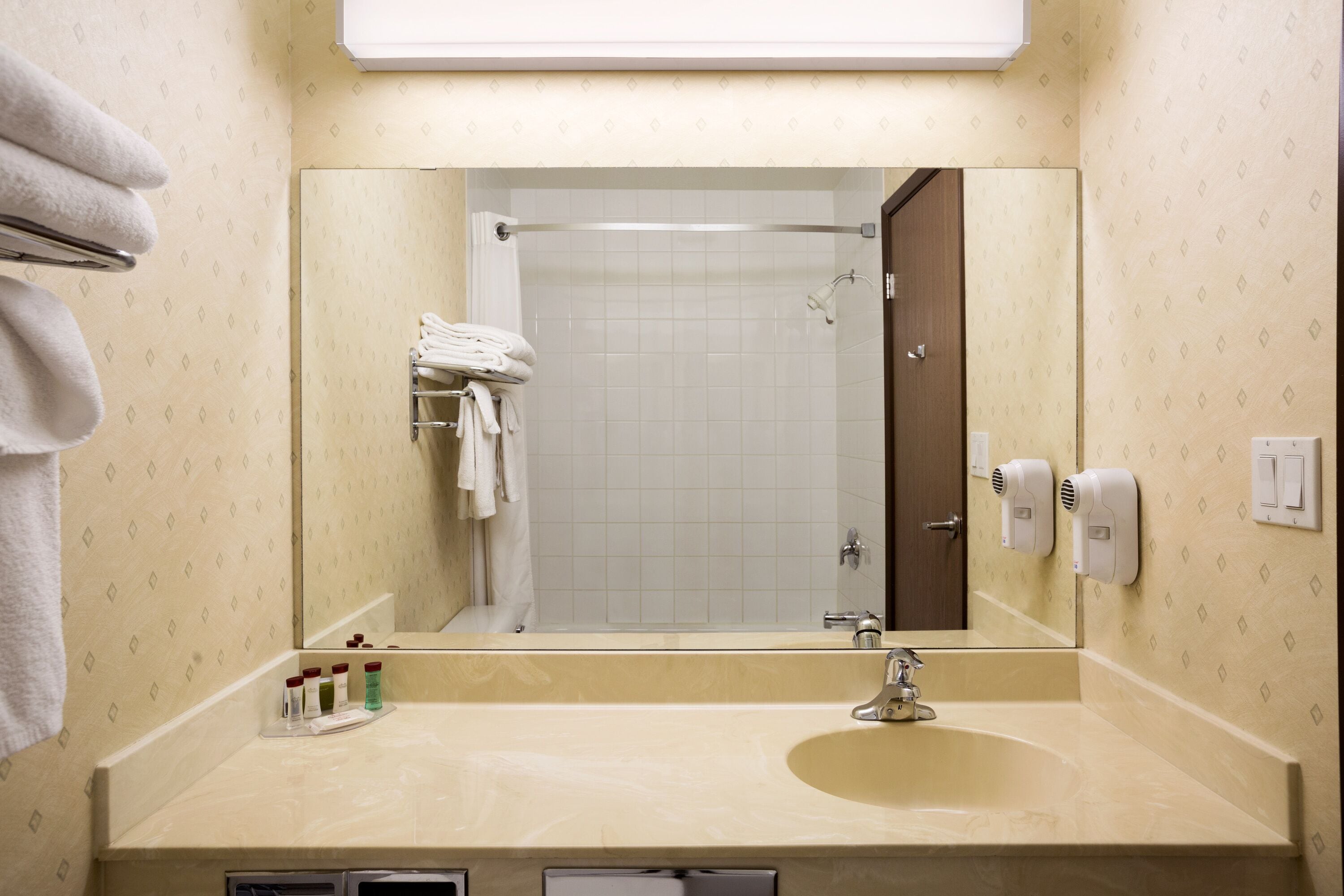 combined shower/bathtub, free toiletries, hair dryer, towels