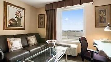 Premium bedding, desk, laptop workspace, blackout curtains
