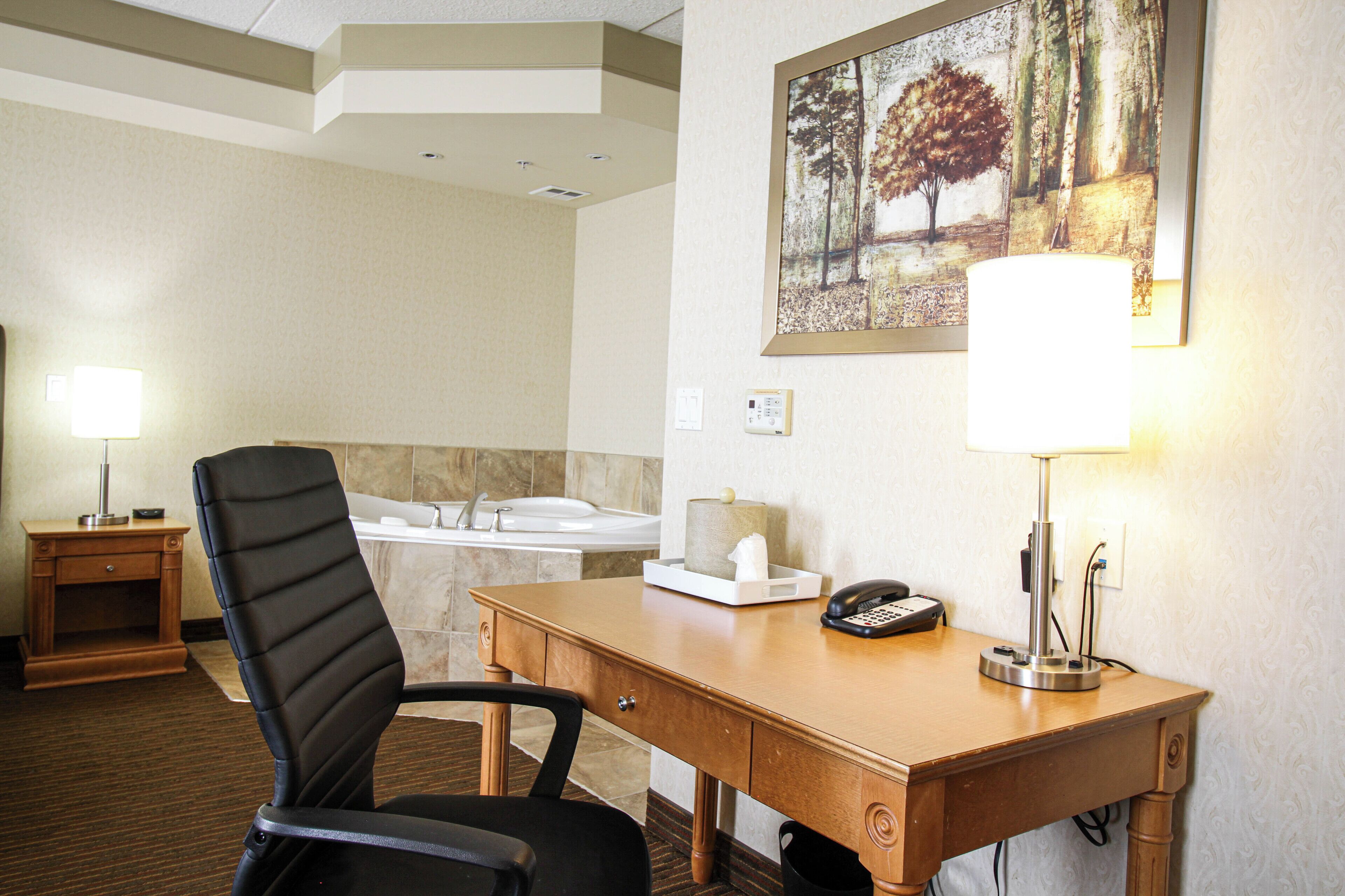 suite, 1 king bed with sofa bed, non smoking | bathroom | separate bathtub and shower, jetted bath, free toiletries, hair dryer