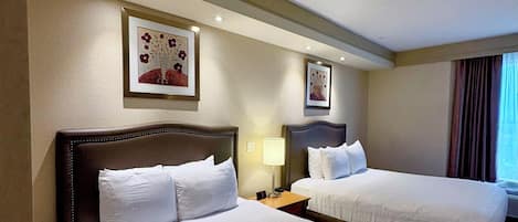 Deluxe Room, Multiple Beds, Non Smoking | Premium bedding, down comforters, pillowtop beds, in-room safe