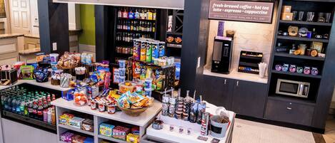 A shop with a variety of snacks, beverages, and specialty coffee.