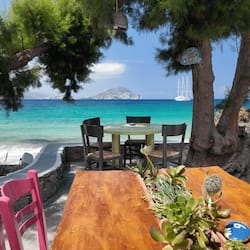 Breakfast, lunch, dinner served; Greek cuisine, beach views