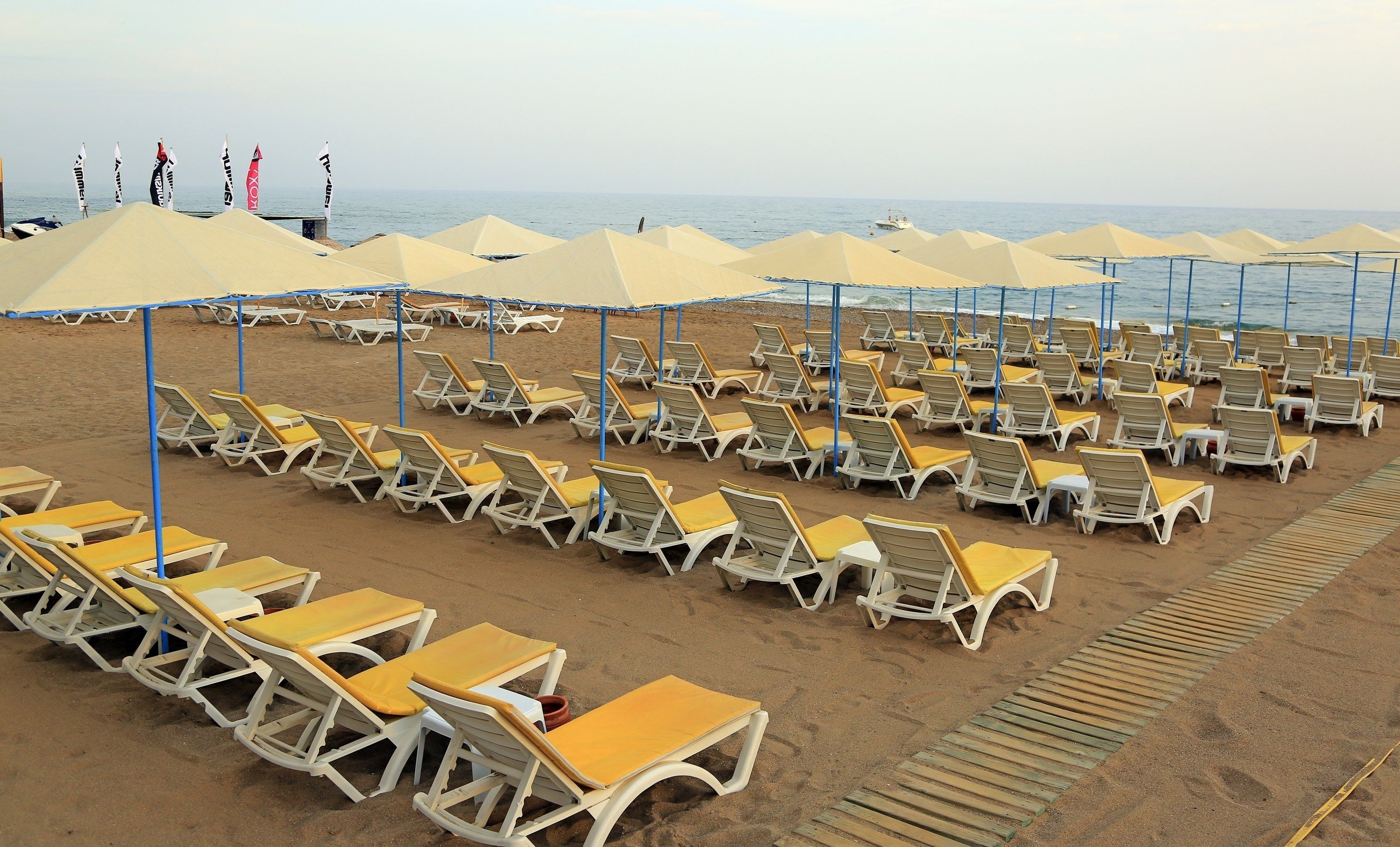 private beach nearby, free beach shuttle, sun-loungers, beach umbrellas