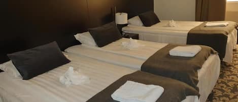 Colchones con acolchado adicional, caja fuerte, mobiliario individual