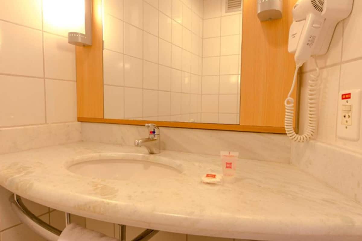 shower, eco-friendly toiletries, hair dryer, towels