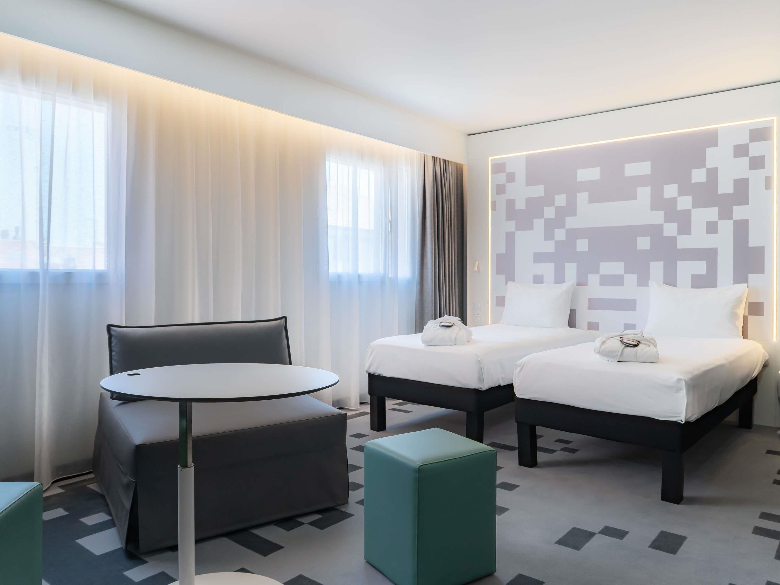 Habitación estándar, varias camas | Ropa de cama de alta calidad y insonorización 