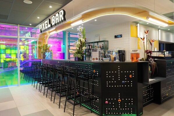 A Pixel Bar with a neon-lit bar counter, bar stools, and a digital clock displaying 7:18.