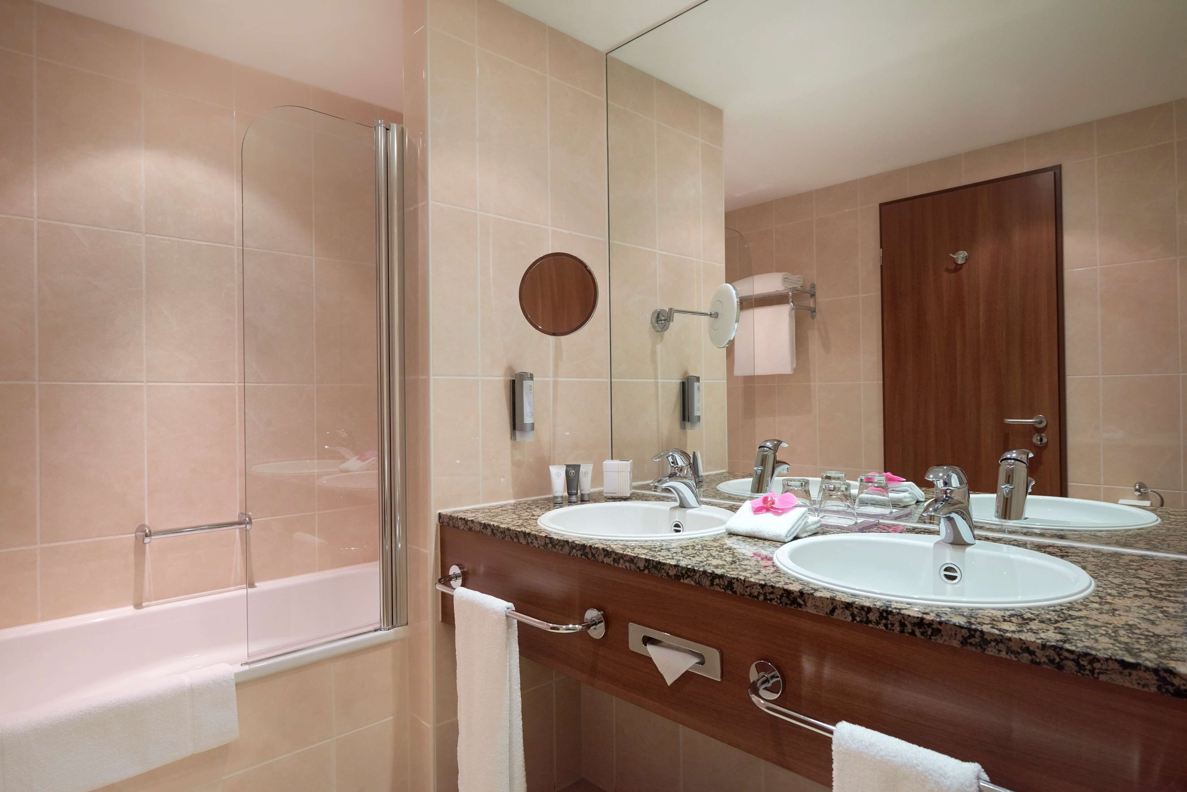 free toiletries, hair dryer, bathrobes, heated floors