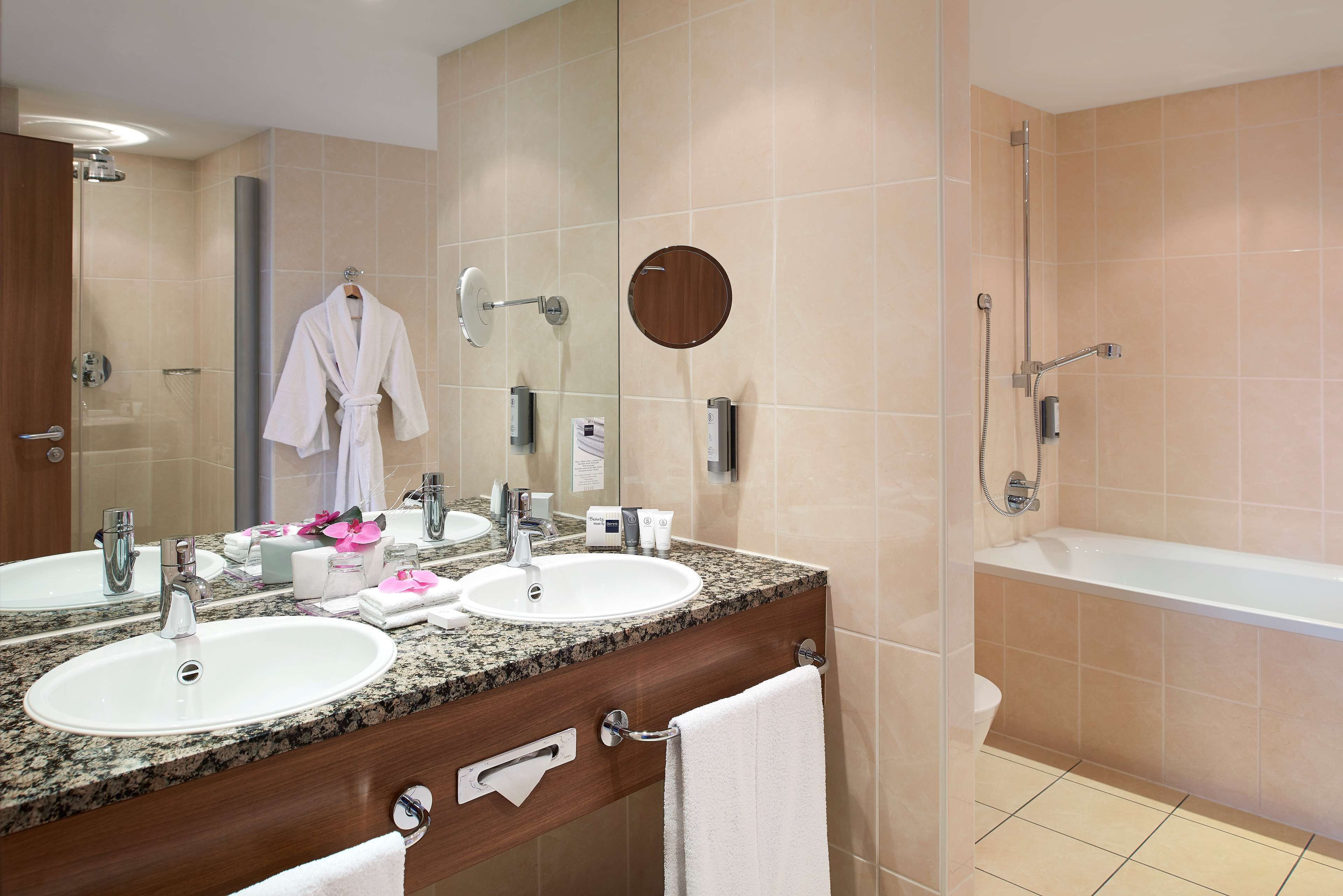 free toiletries, hair dryer, bathrobes, heated floors