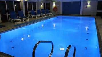 Indoor pool, open 7:30 AM to 9:00 PM, pool loungers