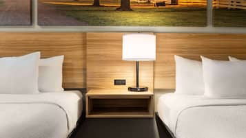 Desk, laptop workspace, blackout drapes, iron/ironing board
