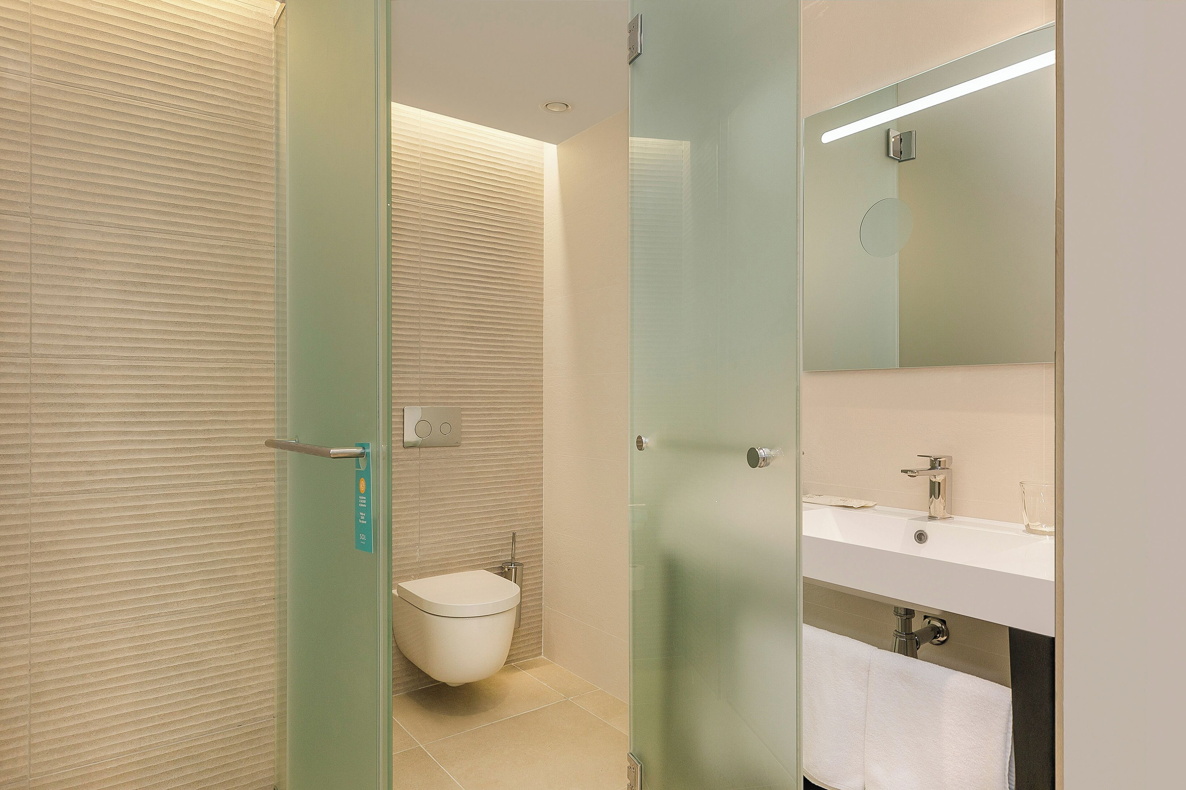 shower, eco-friendly toiletries, hair dryer, towels