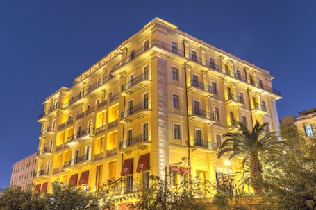 Front of property - evening/night. GDM Megaron Historical Monument Hotel