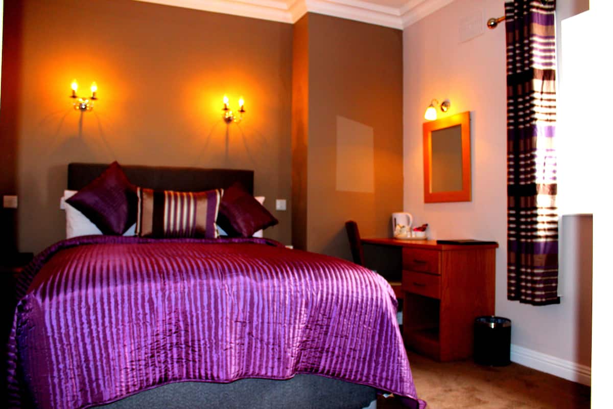 Desk, blackout drapes, iron/ironing board (on request), WiFi (free)