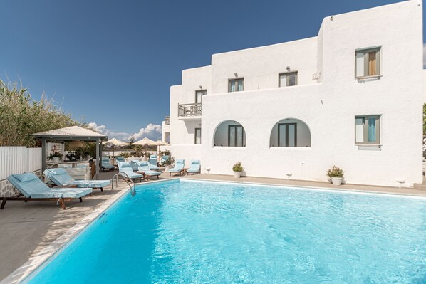 Outdoor pool, pool umbrellas, pool loungers