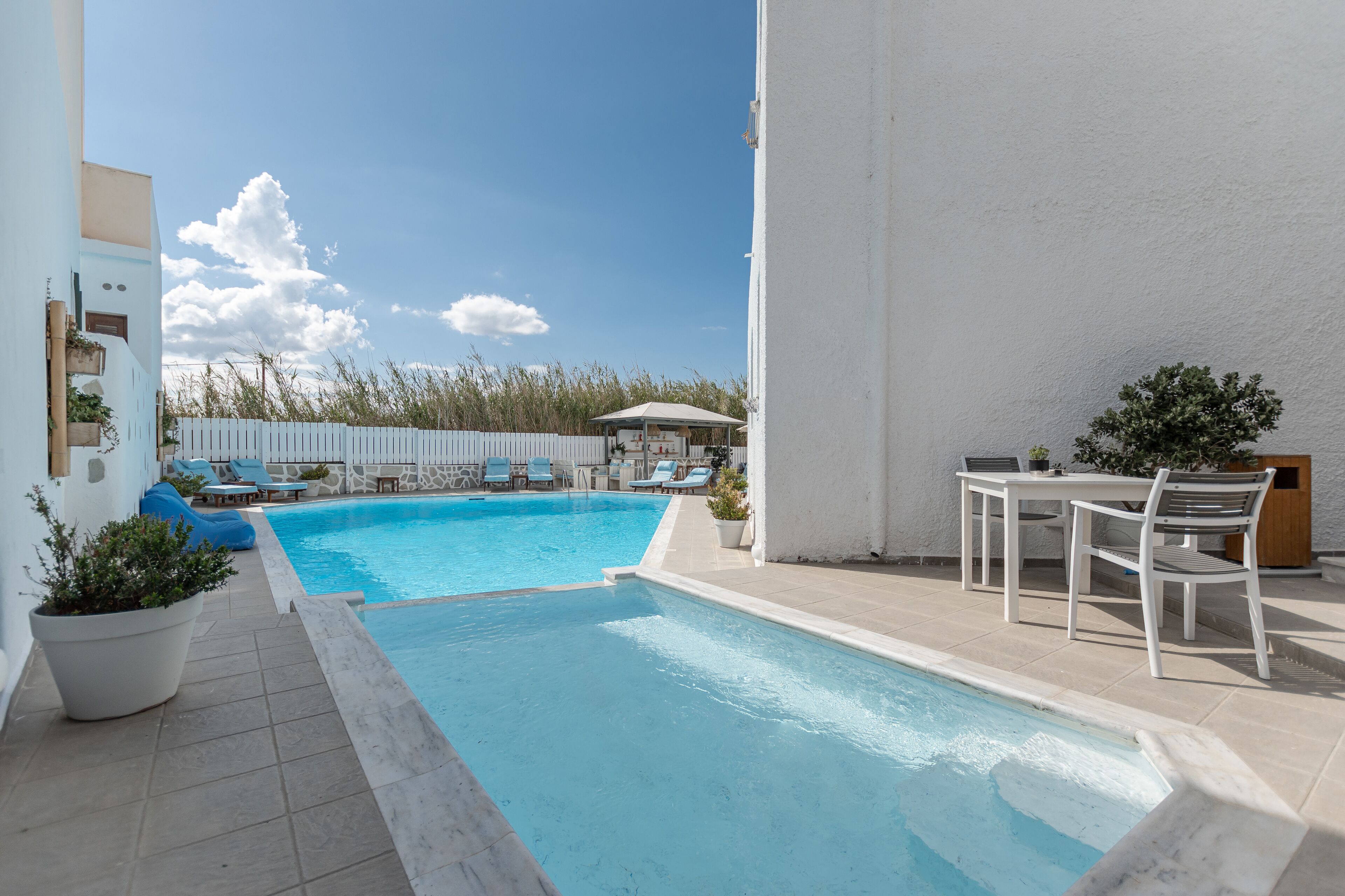 outdoor pool, pool umbrellas, pool loungers