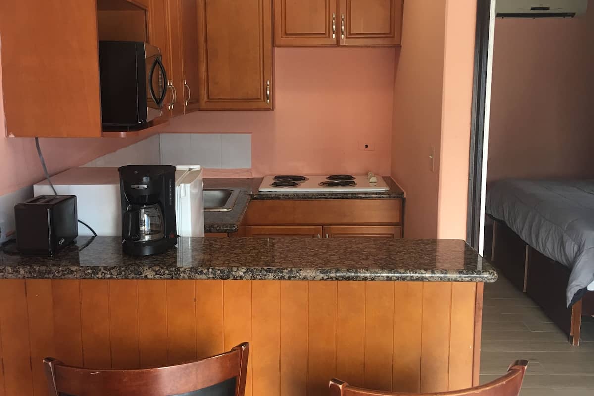 villa, 1 bedroom | private kitchenette | fridge, microwave, coffee/tea maker, eco-friendly cleaning products