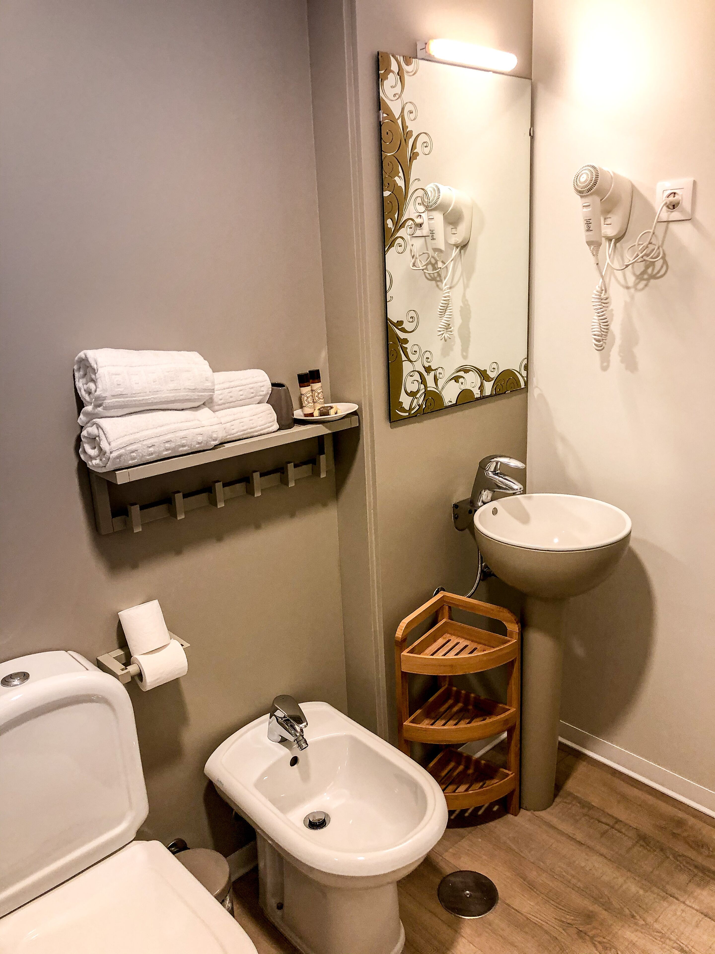 junior suite | bathroom | shower, hair dryer, towels, soap