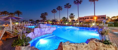 Indoor pool, outdoor pool, open 10 AM to 6 PM, pool loungers