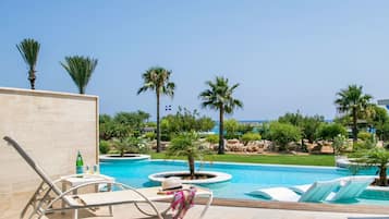 Indoor pool, seasonal outdoor pool, pool umbrellas, sun loungers