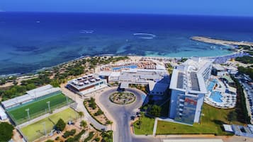 Enjoy a scenic ocean view from this hotel's beachfront location, featuring a pool, tennis court, and beautifully landscaped garden.
