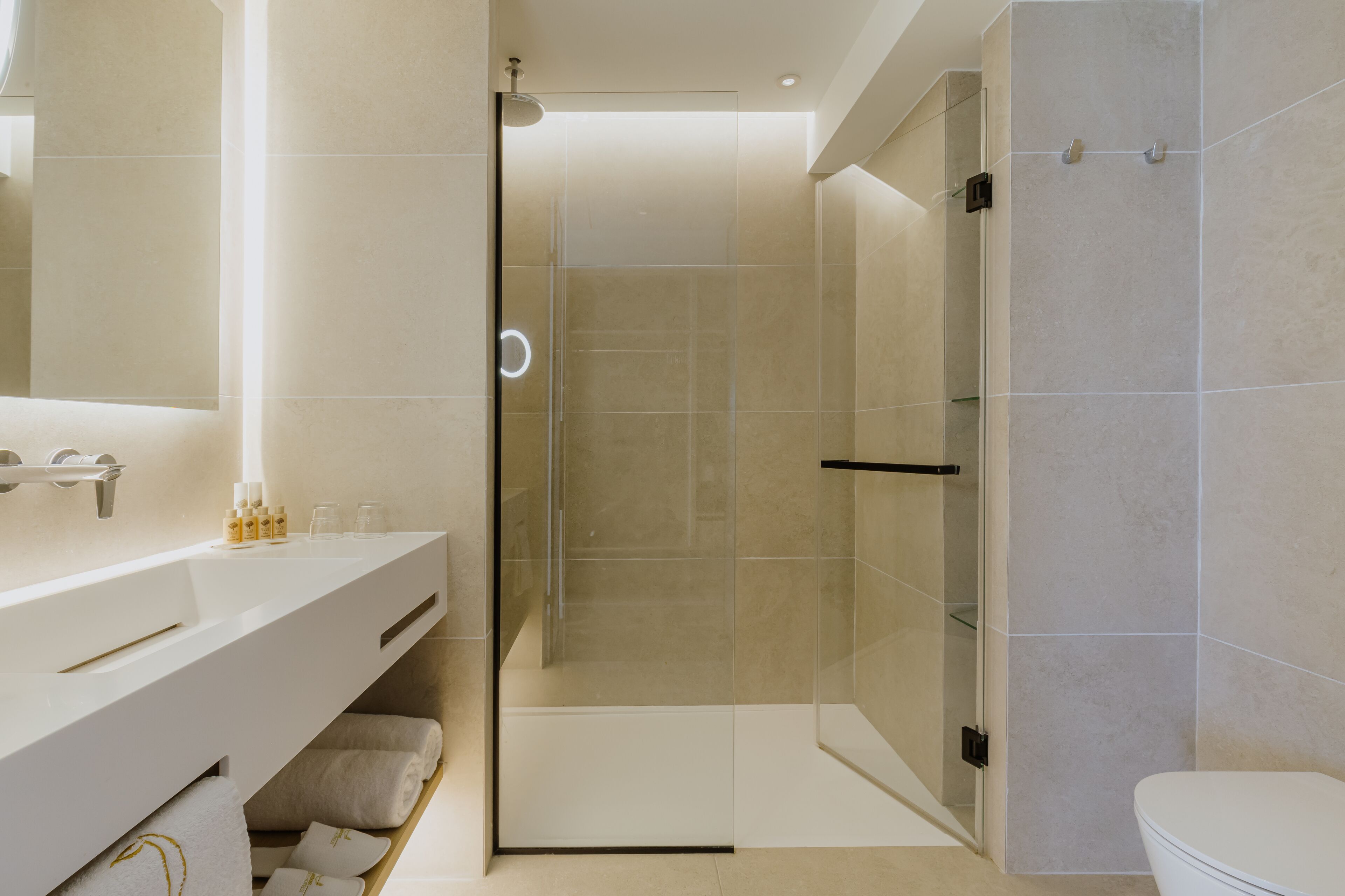 grand suite | bathroom | free toiletries, hair dryer, slippers, towels