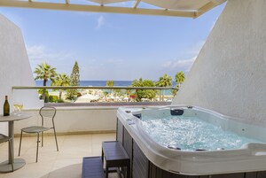 Superior Room, Jetted Tub, Sea View | Minibar, in-room safe, desk, blackout drapes