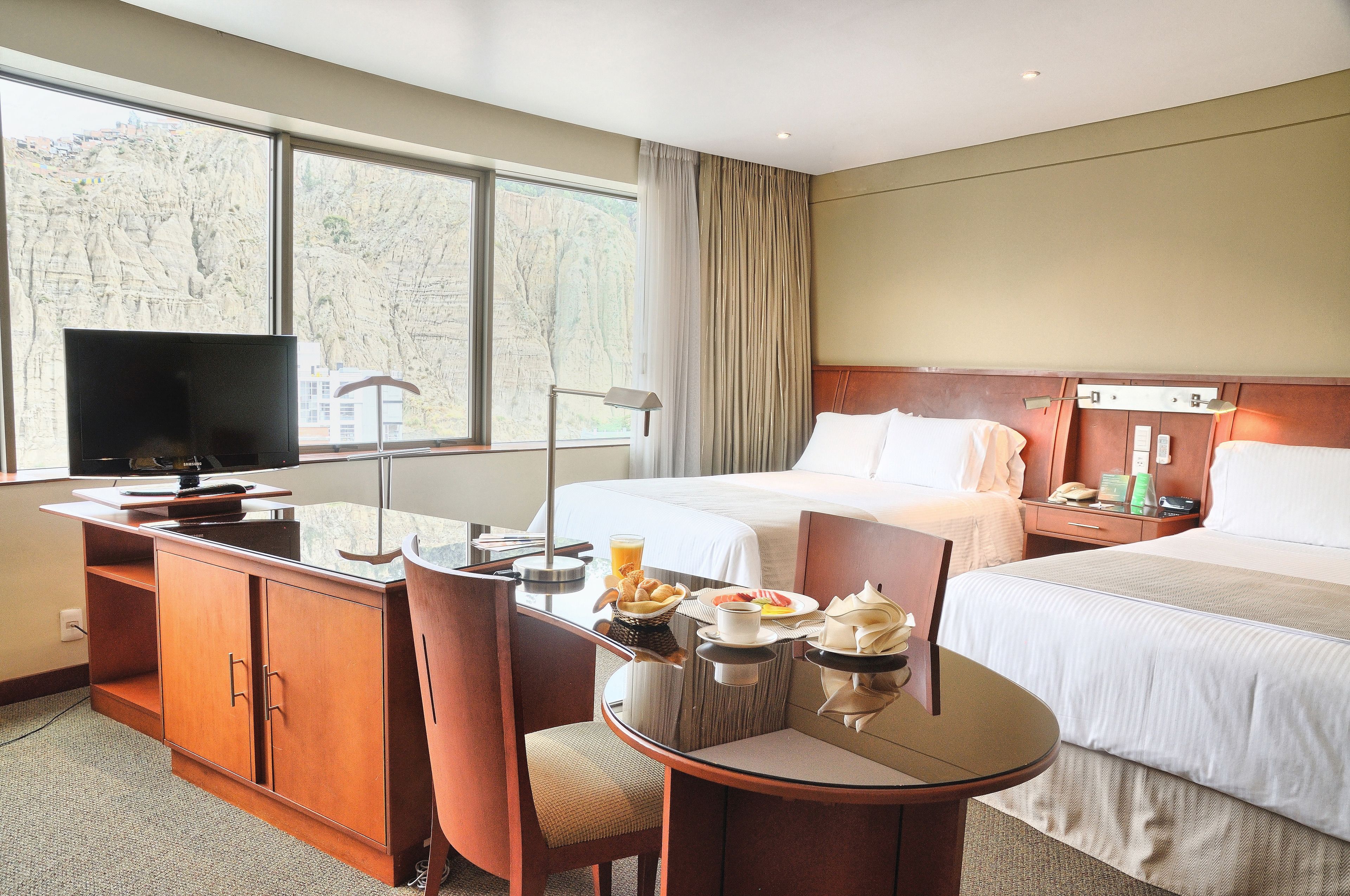 suite, 2 queen beds | in-room dining