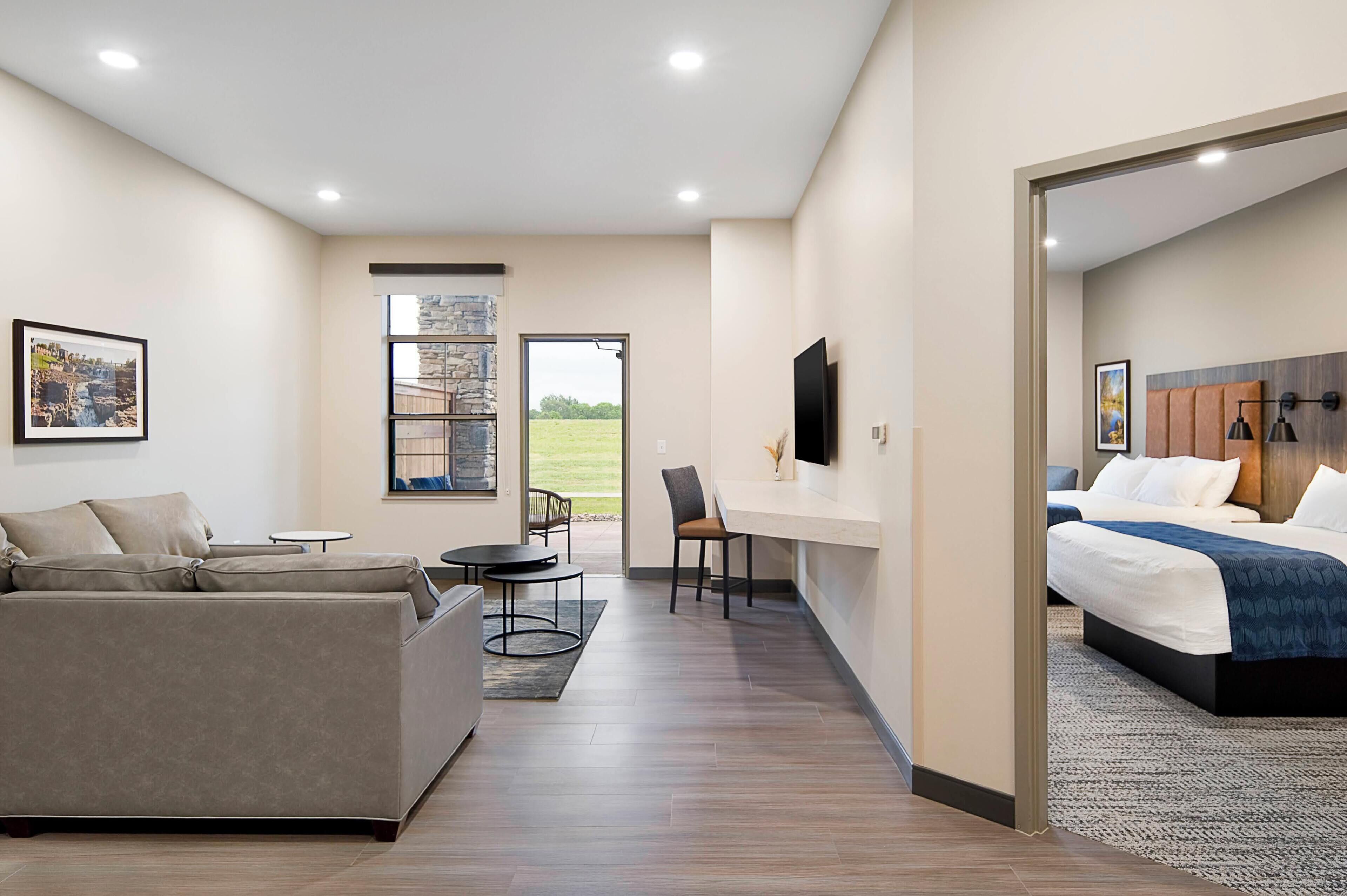 Suite, 2 Queen Beds (Courtyard) | Living area | LED TV, pay films