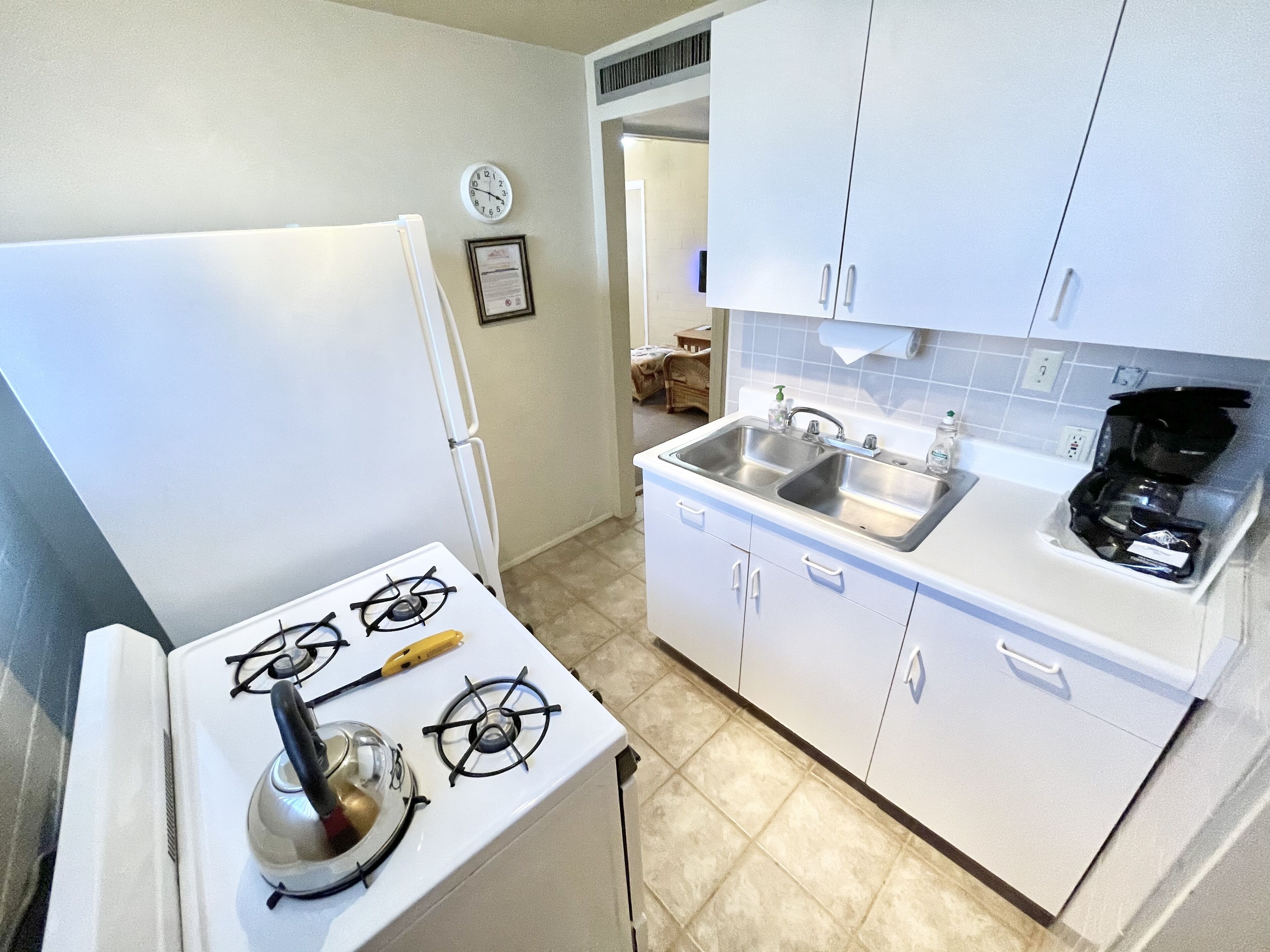 one bedroom king patio-garden bungalow kitchen | private kitchen | full-sized fridge, microwave, stovetop, coffee/tea maker
