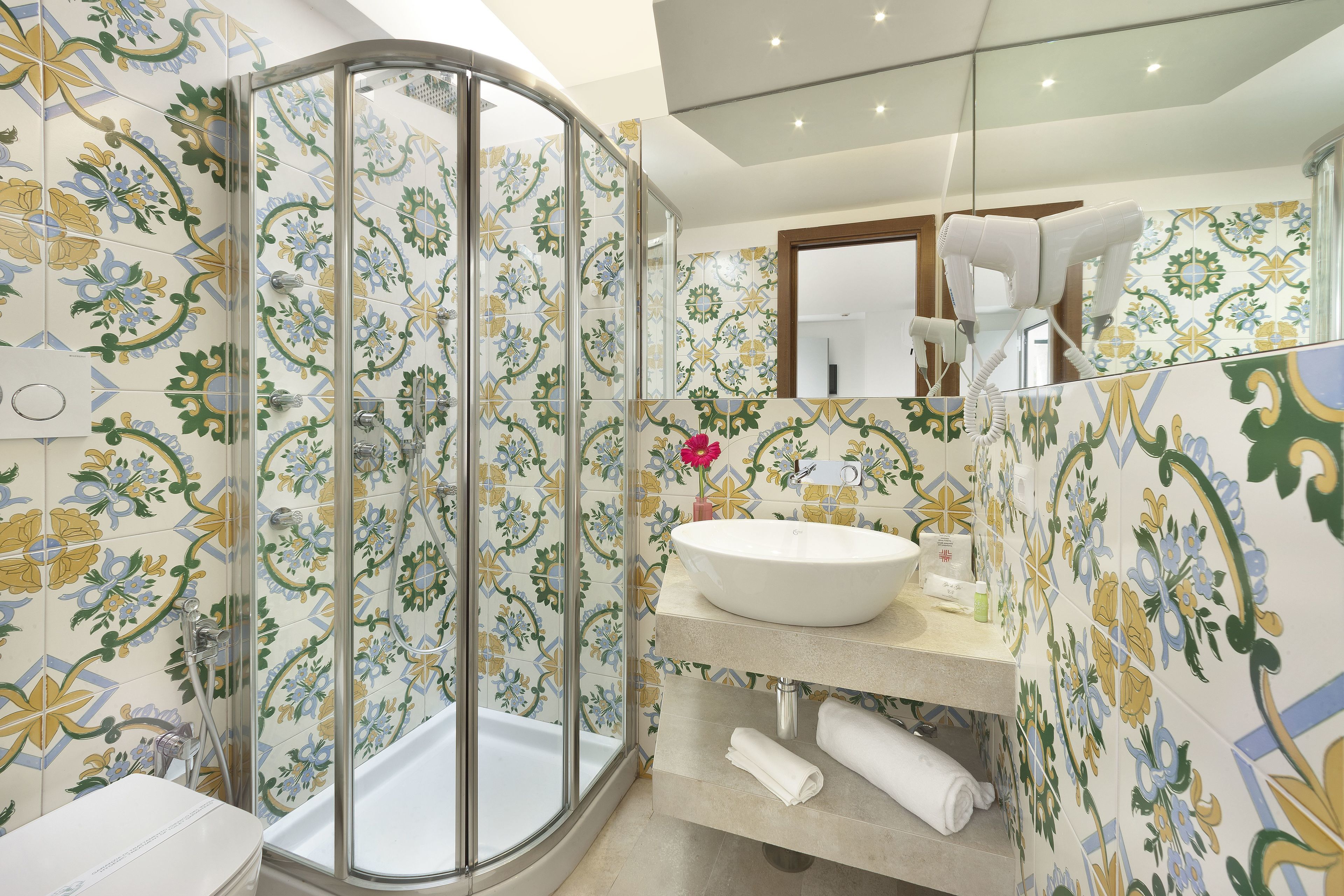 jetted bath, rainfall showerhead, free toiletries, hair dryer