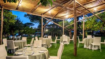 Dinner served, Mediterranean cuisine, garden views