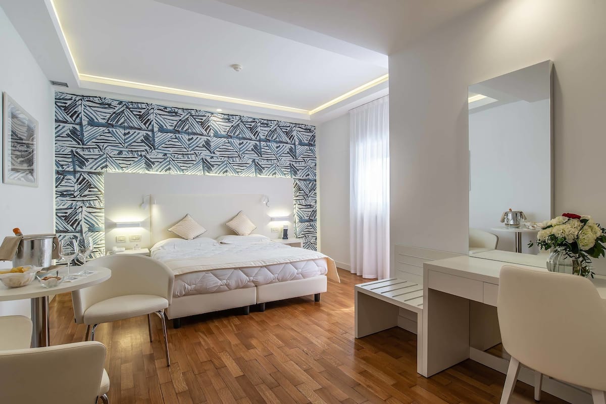 premium bedding, minibar, in-room safe, individually decorated