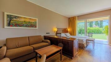 Junior Suite, Garden View | Down comforters, minibar, in-room safe, desk