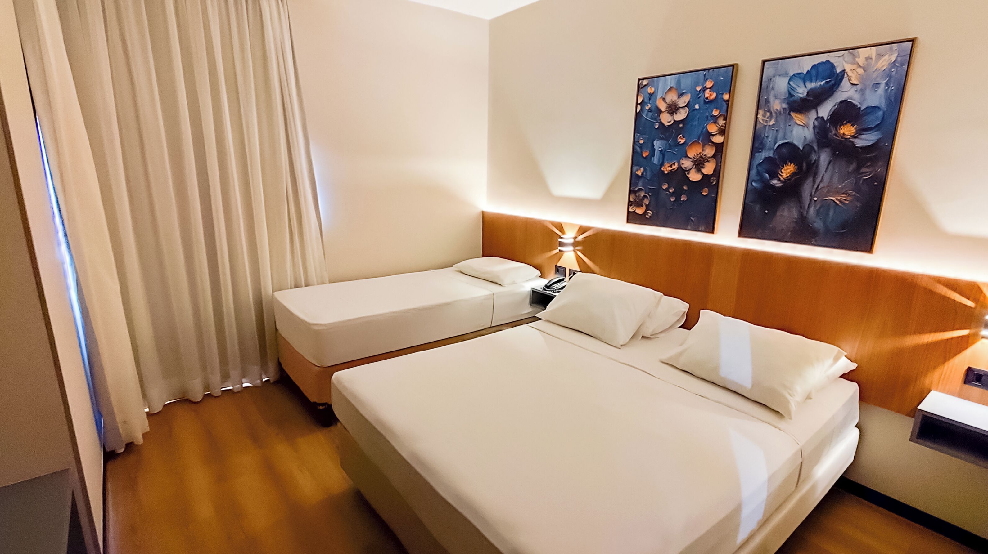 Tremannsrom – deluxe | Minibar, wi-fi (inkludert) og sengetøy