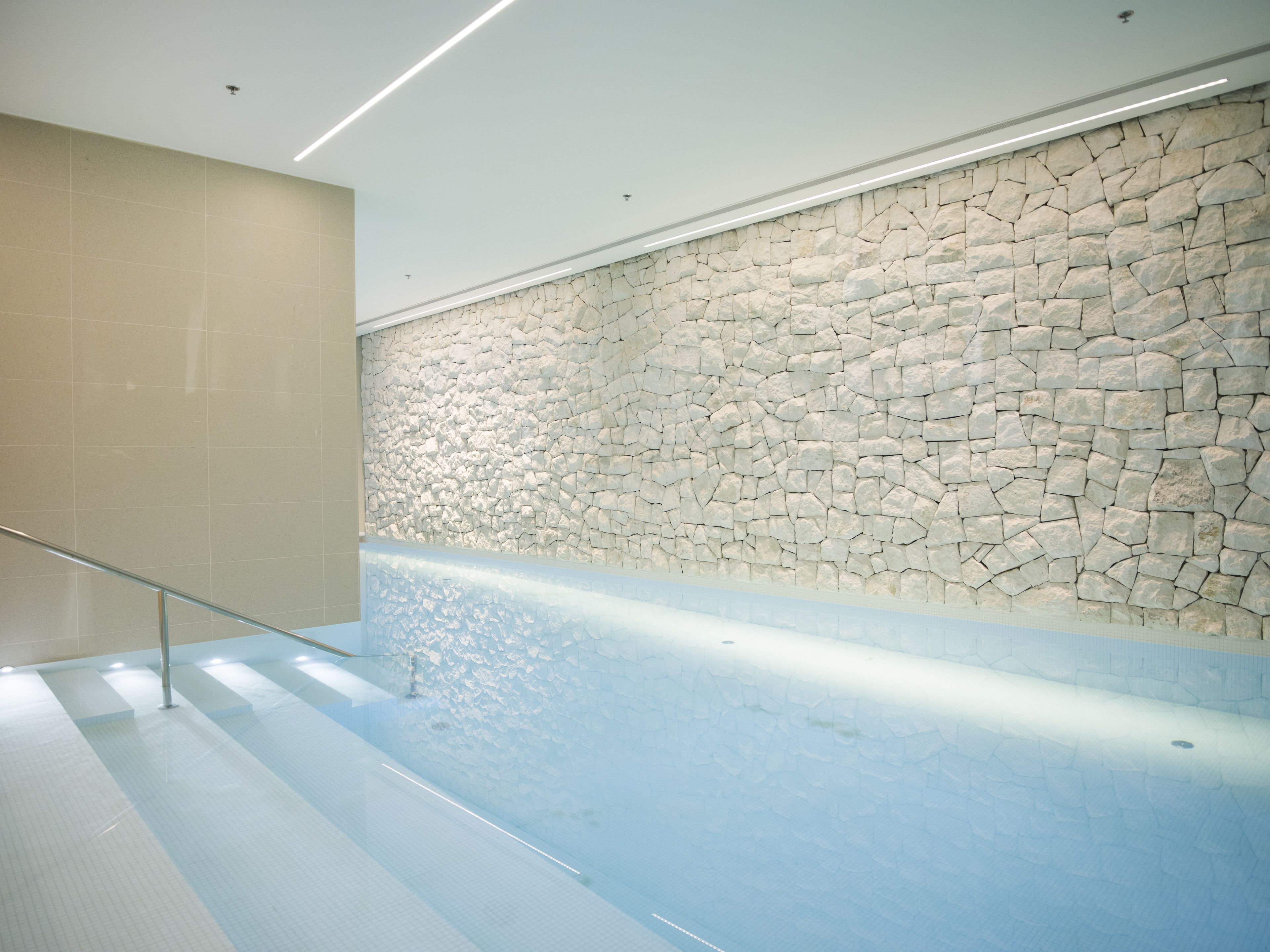 indoor pool, outdoor pool, pool umbrellas, pool loungers