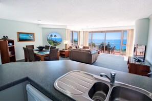 Two Bedroom Superior Ocean Apartment | Living area | 35-inch flat-screen TV with cable channels, TV - Osprey Apartments (Mooloolaba)
