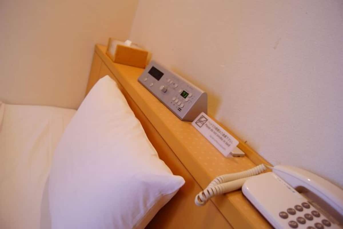 Hypo-allergenic bedding, down duvets, memory-foam beds, desk